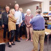 The winning team (The Saga Louts representing the Lutterworth u3a) are presented with the trophy from Rtn. David Elliott.